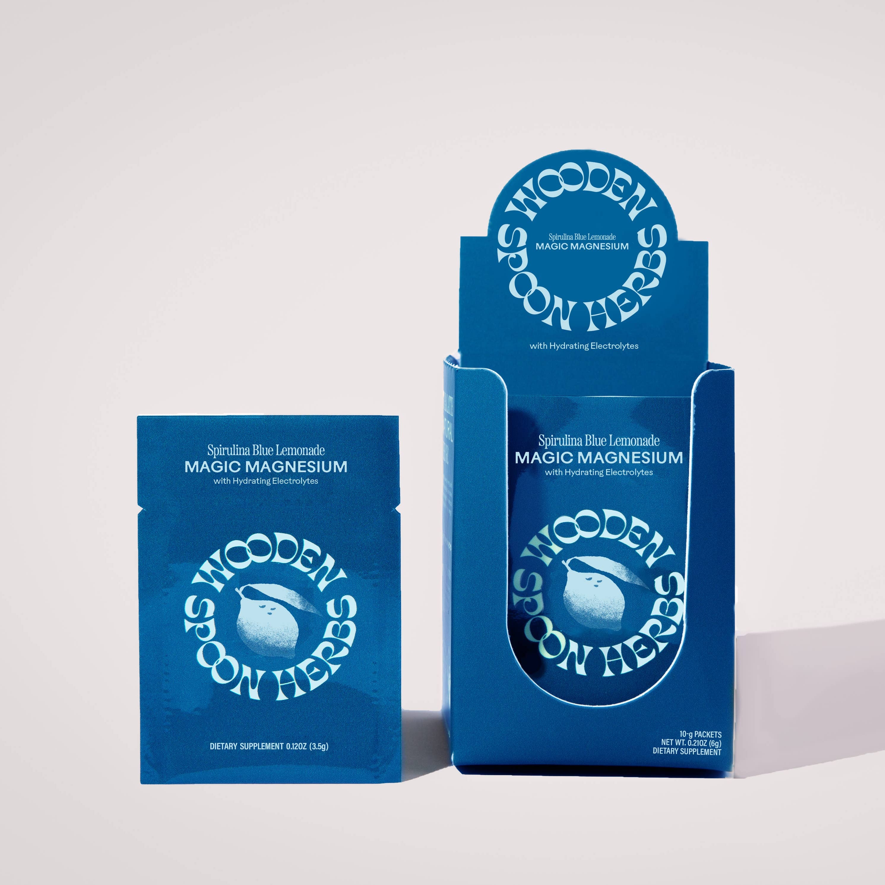 Blue packaging of 'Wooden Spoon Herbs' on a white background