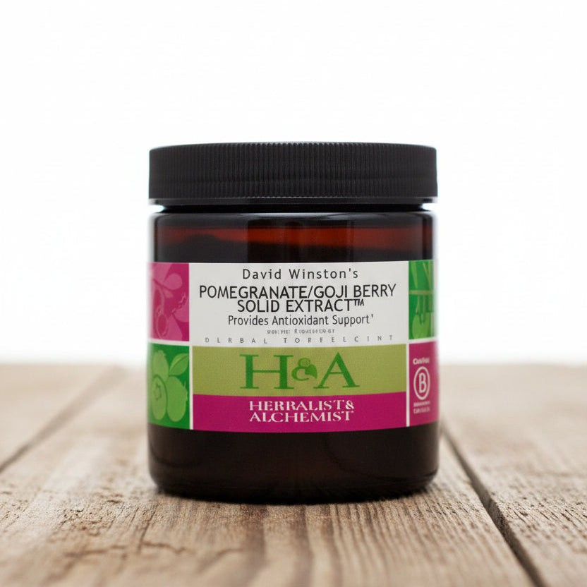 Jar of David Winston's Pomegranate/Goji Berry Solid Extract with a colorful label on a white background.